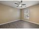 Bedroom featuring a ceiling fan, a window, and hardwood floors at 1600 Long Grove Dr # 1313, Mount Pleasant, SC 29466