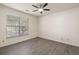 Bedroom featuring a ceiling fan, a window, and hardwood floors at 1600 Long Grove Dr # 1313, Mount Pleasant, SC 29466
