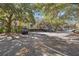 Apartment complex nestled among mature trees with ample parking space, blending nature with convenience at 1600 Long Grove Dr # 1313, Mount Pleasant, SC 29466