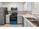 View of the kitchen features stainless steel appliances, a dishwasher, and cabinets at 1600 Long Grove Dr # 1313, Mount Pleasant, SC 29466