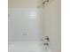 Close-up of a clean white tiled shower with modern fixtures, offering a pristine bathing experience at 1600 Long Grove Dr # 1313, Mount Pleasant, SC 29466