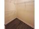 A bright walk-in closet with built-in shelving for storage at 1600 Long Grove Dr # 1313, Mount Pleasant, SC 29466