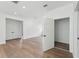 Bedroom featuring hardwood floors, white walls, and a doorway to another room at 1640 Siloh Siloh Dr # 477, Mount Pleasant, SC 29466