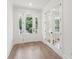 Bright entryway with hardwood floors, a front door view, and stylish doors at 1640 Siloh Siloh Dr # 477, Mount Pleasant, SC 29466