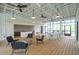 Bright indoor lounge with tables, chairs, ceiling fans, and a service area, perfect for social gatherings at 1640 Siloh Siloh Dr # 477, Mount Pleasant, SC 29466