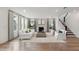 Inviting living room featuring a cozy fireplace, light-filled windows and stylish decor at 1640 Siloh Siloh Dr # 477, Mount Pleasant, SC 29466