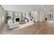 Bright and airy living room with a fireplace, hardwood floors, and comfortable seating at 1640 Siloh Siloh Dr # 477, Mount Pleasant, SC 29466