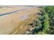 Panoramic aerial view showcasing waterways, lush vegetation, and natural landscape at 1717 Vireo Ct, Johns Island, SC 29455