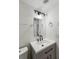 Updated bathroom featuring a modern vanity, black fixtures and contemporary lighting at 1735 Boone Hall Dr # K14, Charleston, SC 29407
