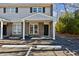 Inviting townhouse with a brick facade, covered entrance, and assigned parking at 1735 Boone Hall Dr # K14, Charleston, SC 29407