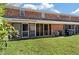 Spacious backyard with ample greenery and patio seating area for relaxing and entertaining at 1836 Mepkin Rd # D4, Charleston, SC 29407