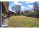 Large backyard with lush lawn and privacy fence, perfect for outdoor activities and relaxation at 1836 Mepkin Rd # D4, Charleston, SC 29407