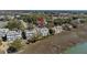 Aerial view of waterfront townhomes featuring solar panels and breathtaking marsh scenery at 1902 Long Bend Dr # 1B, Seabrook Island, SC 29455