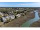 Stunning aerial view of coastal home with marsh views and private dock access at 1902 Long Bend Dr # 1B, Seabrook Island, SC 29455