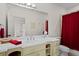 Bathroom featuring a sink, vanity, and a shower with a red curtain at 1902 Long Bend Dr # 1B, Seabrook Island, SC 29455