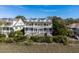 Stylish townhome with double balconies and ample outdoor living space offers serene views at 1902 Long Bend Dr # 1B, Seabrook Island, SC 29455