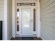 Welcoming front door with decorative glass accents and classic white trim at 1902 Long Bend Dr # 1B, Seabrook Island, SC 29455