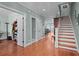 Entryway with hardwood floors and an open floor plan leading to the staircase at 1902 Long Bend Dr # 1B, Seabrook Island, SC 29455