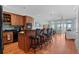 Kitchen bar area with custom cabinets and barstool seating at 1902 Long Bend Dr # 1B, Seabrook Island, SC 29455