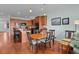 Kitchen dining area with wood floors and custom cabinets at 1902 Long Bend Dr # 1B, Seabrook Island, SC 29455