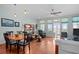 Open floor plan living area with dining area and outdoor access at 1902 Long Bend Dr # 1B, Seabrook Island, SC 29455