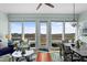 Bright living area with large windows showcasing marsh views and stylish furnishings at 1902 Long Bend Dr # 1B, Seabrook Island, SC 29455