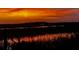 Dark backyard view of marsh with a sunset at 1902 Long Bend Dr # 1B, Seabrook Island, SC 29455