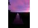 Dimly lit backyard view of marsh with purple sky at 1902 Long Bend Dr # 1B, Seabrook Island, SC 29455