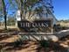Attractive community entrance sign for 'The Oaks' by Beazer Homes set against a backdrop of trees at 2000 Middleton Dr, Goose Creek, SC 29445