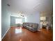 Spacious basement with hardwood flooring, a laundry area, and comfortable seating at 2009 Arundel Pl, Mount Pleasant, SC 29464