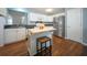 Bright kitchen with stainless steel appliances, a center island, and ample cabinet space at 2009 Arundel Pl, Mount Pleasant, SC 29464