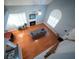 Living room with wood floors, fireplace, vaulted ceilings, and abundant natural light at 2009 Arundel Pl, Mount Pleasant, SC 29464