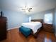 Serene main bedroom featuring a spacious bed, ample natural light, and sleek hardwood floors at 2009 Arundel Pl, Mount Pleasant, SC 29464