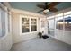 A lovely screened porch features outdoor living space at 2009 Arundel Pl, Mount Pleasant, SC 29464