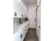 Well-organized pantry with ample white cabinetry, quartz countertops, and stylish black hardware at 2012 Forest Ave, North Charleston, SC 29405