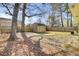 Backyard featuring shed storage, a well-kept lawn and partial shade at 203 Birmingham Dr, Summerville, SC 29486