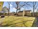 Backyard with shed, well-kept lawn and tree coverage at 203 Birmingham Dr, Summerville, SC 29486
