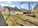 View of the backyard, showing the storage shed and the side of the home at 203 Birmingham Dr, Summerville, SC 29486