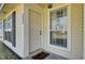 Close-up of a cozy front porch with a decorative welcome mat and charming exterior details at 203 Birmingham Dr, Summerville, SC 29486