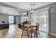 Open-concept living space showcasing a dining area, living room and a bright, airy ambiance at 203 Birmingham Dr, Summerville, SC 29486