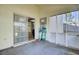 View of the porch featuring a ladder and an open entry into the kitchen at 203 Birmingham Dr, Summerville, SC 29486