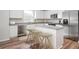 Modern kitchen featuring stainless steel appliances, granite countertops, and bar stool seating at 203 West Bradford Pointe Dr, Summerville, SC 29483
