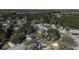 Areal view showcases a suburban community with lush greenery, well-spaced houses, and a glimpse of a private pool at 2058 Willowdale Ct, Mount Pleasant, SC 29466