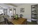 Charming dining area featuring a wooden table with seating and views into the living space at 2058 Willowdale Ct, Mount Pleasant, SC 29466