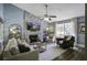 Comfortable living room featuring a stone fireplace and ceiling fan at 2058 Willowdale Ct, Mount Pleasant, SC 29466
