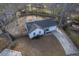 Aerial view of home with a long driveway and well manicured landscaping at 206 Braly Dr, Summerville, SC 29485