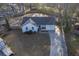 The exterior of this single Gathering home has a manicured front yard with a long private driveway at 206 Braly Dr, Summerville, SC 29485