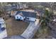 The exterior shows the house with a manicured front yard, mature trees and a private driveway at 206 Braly Dr, Summerville, SC 29485
