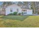 This beautiful single Gathering home has a meticulously landscaped front yard, automatic garage and covered porch entry at 206 Braly Dr, Summerville, SC 29485