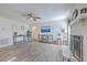 Spacious living room with luxury vinyl plank flooring, and cozy fireplace at 206 Braly Dr, Summerville, SC 29485